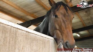 German couple fucks in a riding stable